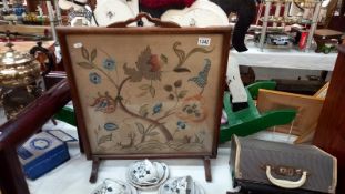 A vintage glazed oak framed tapestry fire screen, COLLECT ONLY