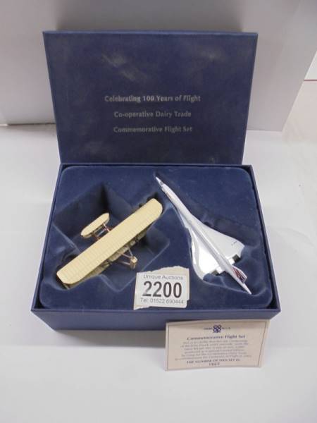 A boxed Co-operative Dairy Trade 100 years of Flight commemorative set.