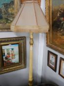 An early 20th century standard lamp with 1920's shade. COLLECT ONLY.