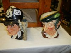 Two Royal Doulton character jugs.