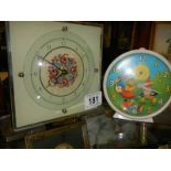 A Noddy clock and one other.