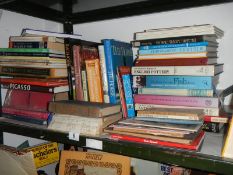 A good lot of art and antique reference books, one shelf.