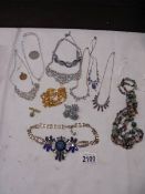 A mixed lot of crystal, diamonte' and other necklaces etc.,