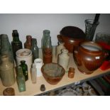 A mixed lot of old pots and bottles etc.,