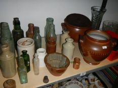 A mixed lot of old pots and bottles etc.,