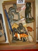 A mixed lot of collectables including tribal figures etc.,