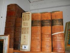 Three volumes of Scott on the Bible, a family Bible and other Bibles.