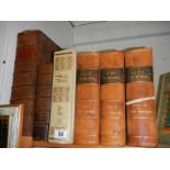 Three volumes of Scott on the Bible, a family Bible and other Bibles.