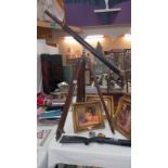 A leather bound brass telescope on tripod stand COLLECT ONLY