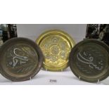 Three Indian brass trays with white metal overlay.