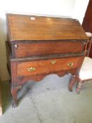 A Victorian mahogany bureau on base, COLLECT ONLY.