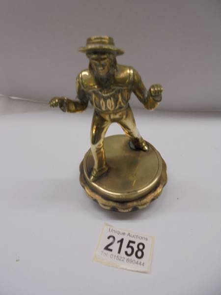 A brass figure of a Spanish Matador (possibly a car mascot).