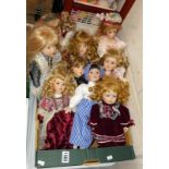 A box of 9 collectors Dolls (some with stands), COLLECT ONLY