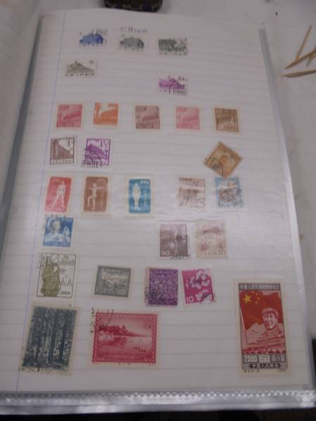 A large folder of UK stamps up to 2000 and a large folder of world stamps. - Image 3 of 17