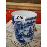 A blue and white Chinese tankard.