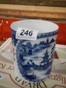 A blue and white Chinese tankard.