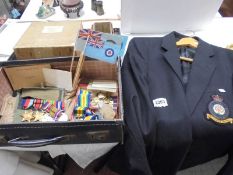 A case of medals, badges, ephemera, boxes etc., some RAF related and a jacket.