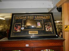 A framed Sugar Ray Leonard boxing montage, COLLECT ONLY.
