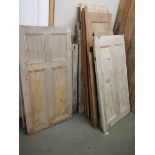 Twelve antique pine cupboard doors. COLLECT ONLY.