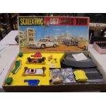 A 1967/68 Scalextric James Bond 007 set. It features an original box and both cars in working order.