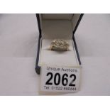 A 9ct gold and diamond ring, size P half, 4 grams in total.