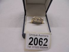 A 9ct gold and diamond ring, size P half, 4 grams in total.