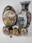 A mixed lot of oriental vases etc.,