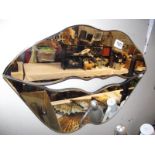 A decorative lips wall mirror COLLECT ONLY