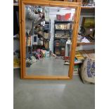 A pine framed mirror. COLLECT ONLY.