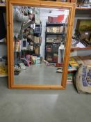 A pine framed mirror. COLLECT ONLY.