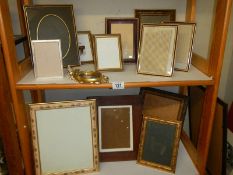 A quantity of photo frames.