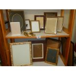 A quantity of photo frames.