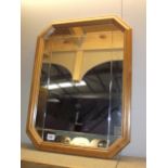 A pine framed mirror - 68cm x 52cm. COLLECT ONLY