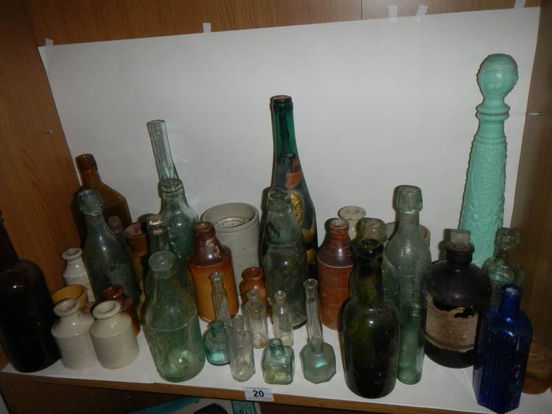 A mixed lot of vintage bottles etc.,