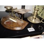 A brass candle holder with lifter and postal scales (no weights)