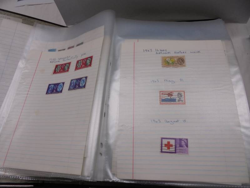 A large folder of UK stamps up to 2000 and a large folder of world stamps. - Image 9 of 17