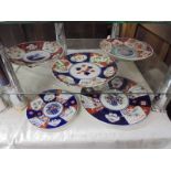 Five assorted Imari plates.