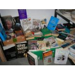 A large lot of paperback books. COLLECT ONLY.