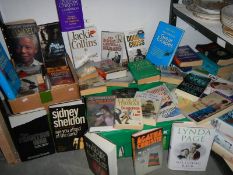 A large lot of paperback books. COLLECT ONLY.