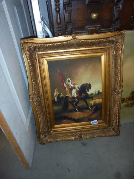 A gilt framed painting on board featuring a horse and rider, COLLECT ONLY.
