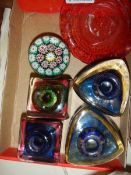 A millifiori paperweight and four glass inkwells etc.,