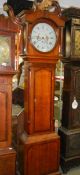 A good oak cased 30 hour long case clock in working order, COLLECT ONLY.