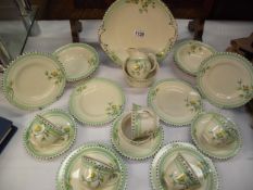 A 27 piece art deco tea set including 6, cups, saucers, plates, bowls, milk jug, sugar bowl and
