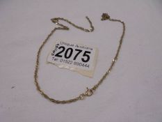 A 9ct gold neck chain, a/f, 1.8 grams.