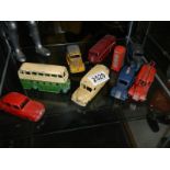 A quantity of play worn die cast models including buses, fire engine etc.,