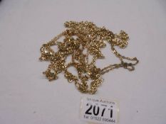 A quantity of yellow metal chains,