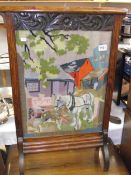 A 1930's oak fire screen with wool work of farming scene 54cm x 81cm COLLECT ONLY