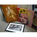 A Marylin Monroe picture on canvas and two Elvis pictures.