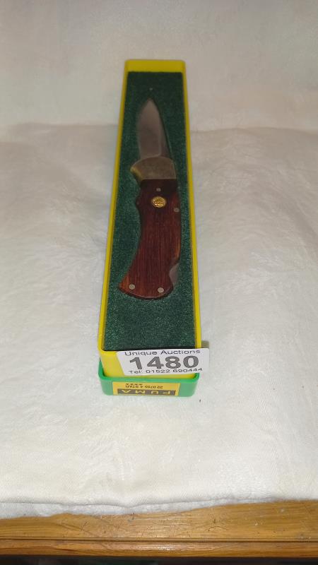 A boxed Puma 705 knife