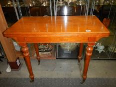 A good clean mahogany fold over games table on casters. COLLECT ONLY.